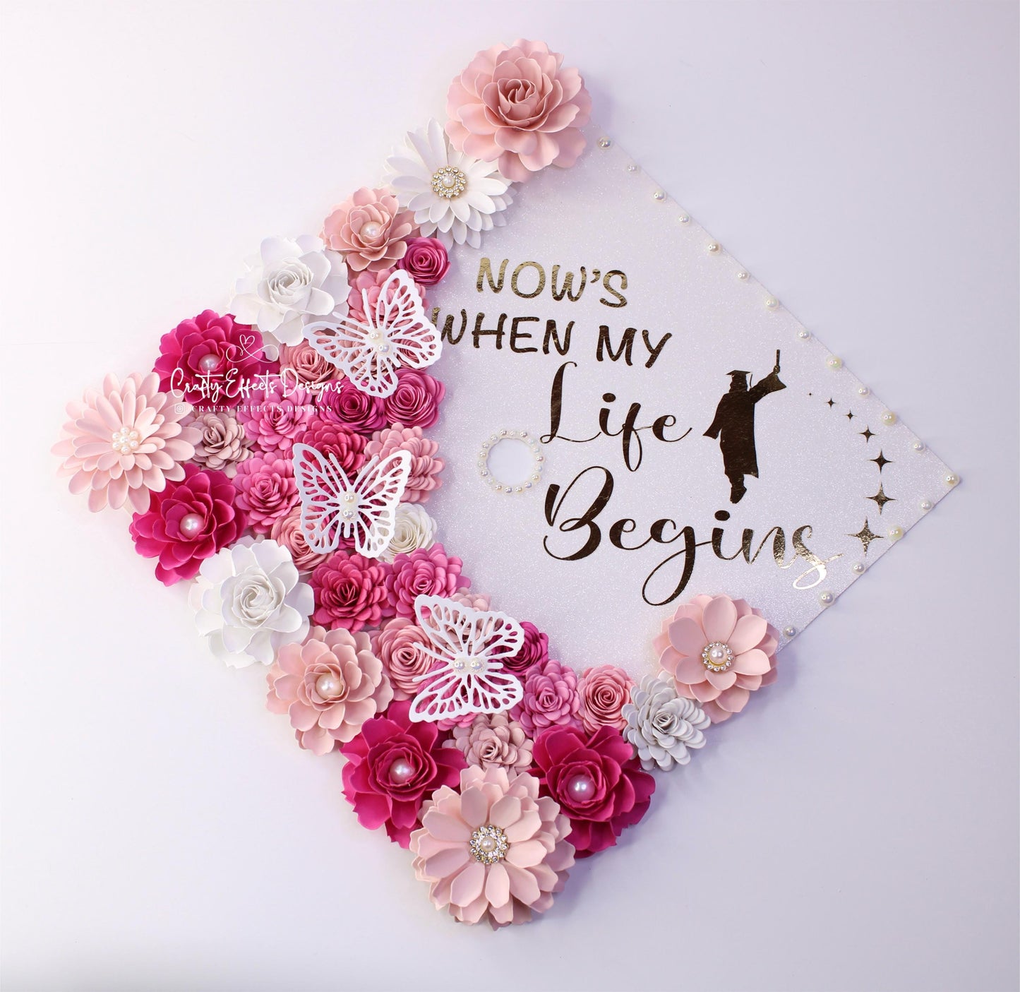 Adorno para birrete de graduación rosa coqueto